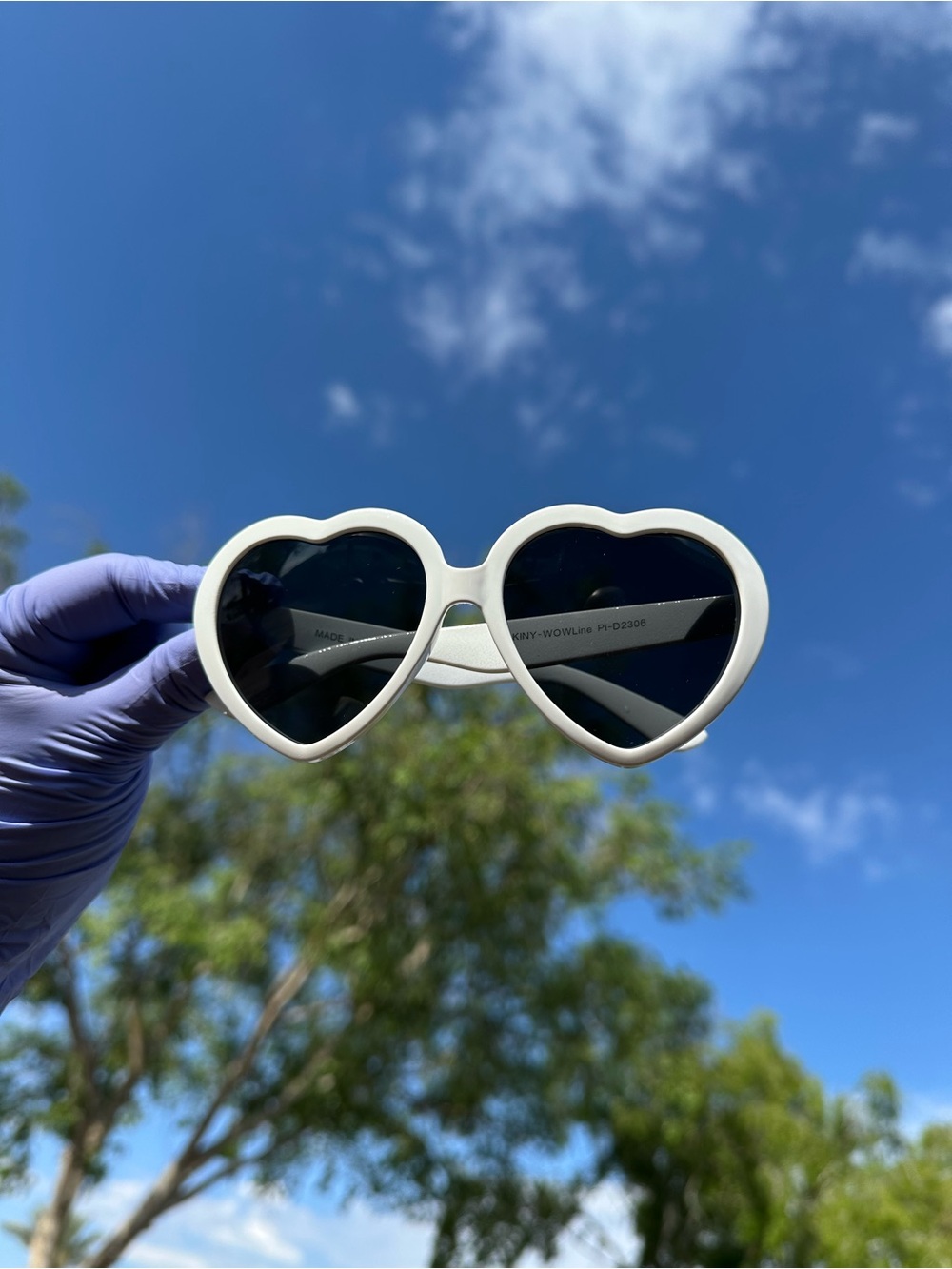 White Heart-Shaped Sunglasses with Dark Lenses